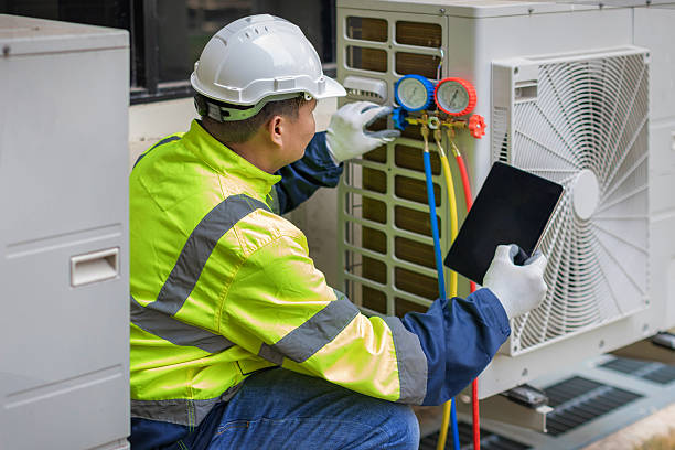 Professional Hvac technician working in Wakarusa, IN